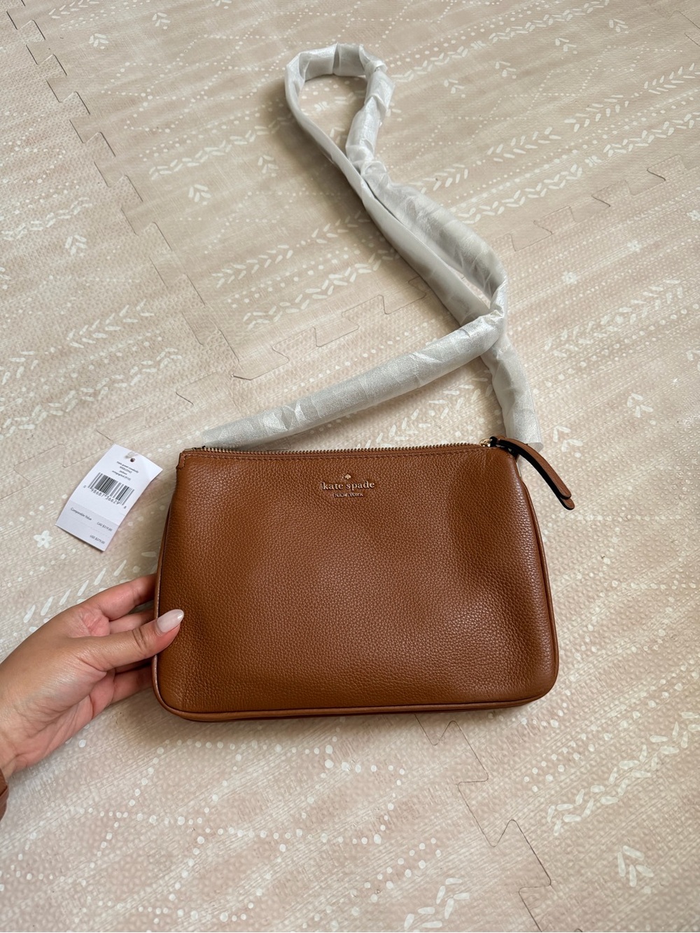 kate spade tan pebble leather crossbody with gold logo